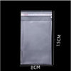 A transparent plastic bag for jewelry, candy, or gifts, measuring 8cm by 15cm.