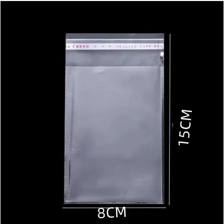 A transparent plastic bag for jewelry, candy, or gifts, measuring 8cm by 15cm.