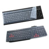 A black universal silicone keyboard protector cover with a clear plastic sheet and red keycaps is shown.