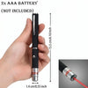 A black interactive pet training pen is held in a hand, showing its length and diameter.