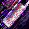 Close-up of a silver and red hot-swap mechanical gaming keyboard with purple RGB lighting effects.