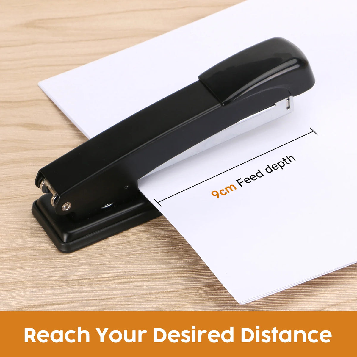 A black heavy-duty metal stapler with a 9cm feed depth is shown on a white background.
