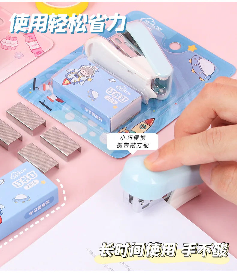 A white cartoon mini stapler is shown next to its packaging and a hand demonstrating its use.
