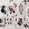 Colección de pegatinas temporales con diseños multi, mostrando gatos estilizados y patrones florales.