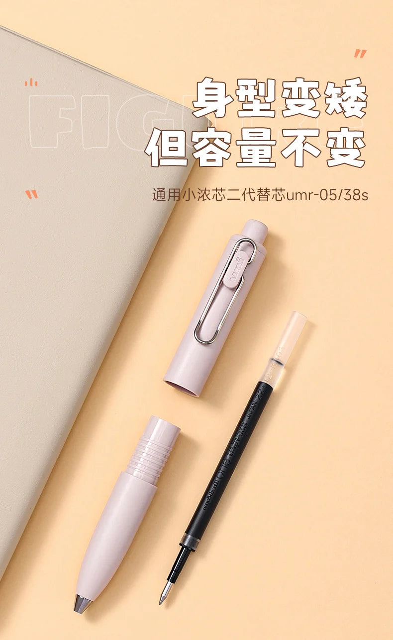 A light pink Uni-Ball One Mini Cute Gel Pen is shown next to its packaging, demonstrating a flat angle view.