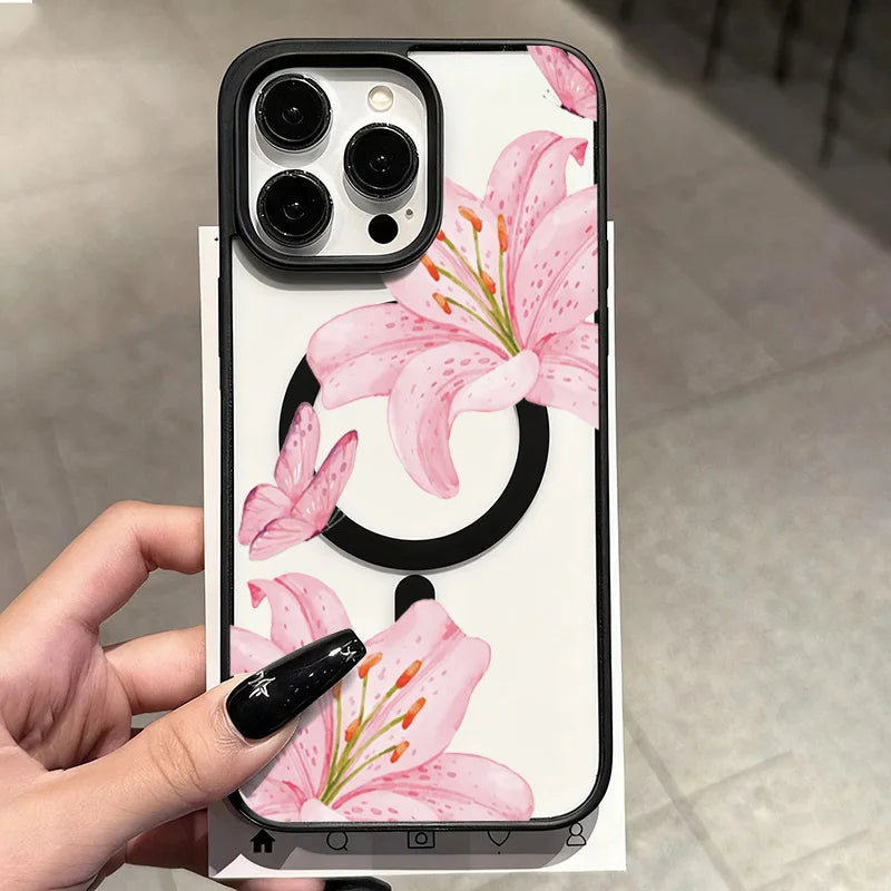 A transparent iPhone case featuring a pink lily floral design with a black shockproof bumper.