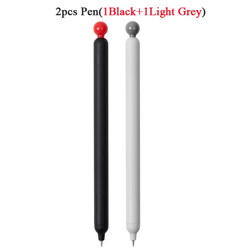 Two pens are shown: one black and one light grey, with red caps.