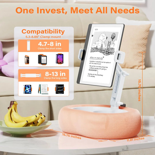 An adjustable pillow tablet and Kindle stand with a soft pink plush fabric resting on a table.