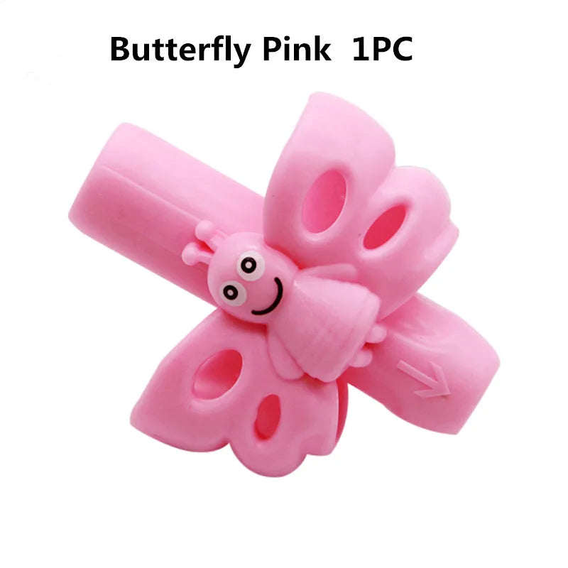 A single pink butterfly shaped silicone pencil grip for children's handwriting aid.