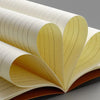 A stack of A5 Kraft cover notebook for students and office in light yellow color.