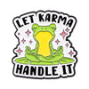 Enamel pin featuring a frog meditating with the text LET KARMA HANDLE IT