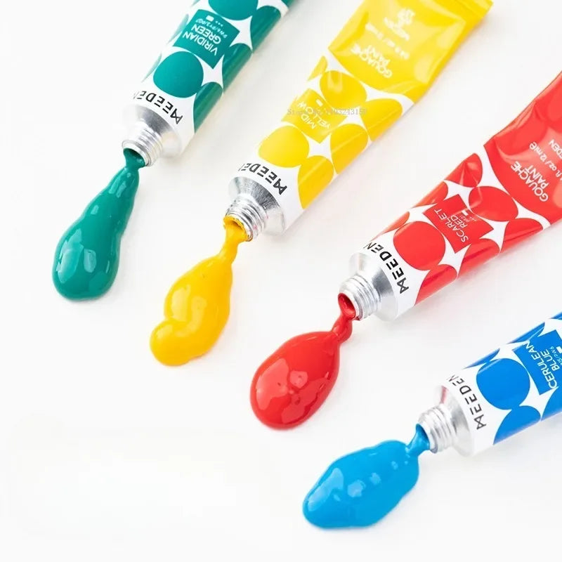 A set of six tubes of vibrant gouache paint in various colors including green, yellow, red, and blue.
