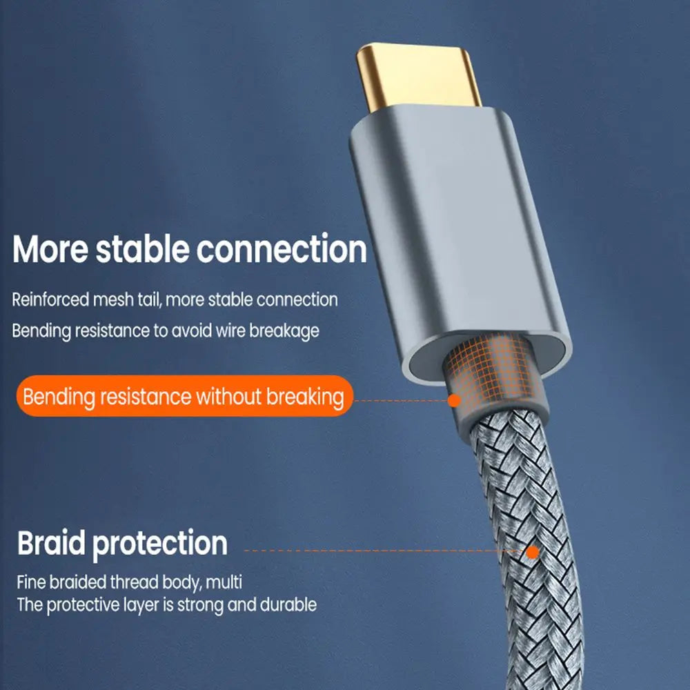 Close-up of a durable braided USB-C to USB B printer cable with a metal connector and protective braid.
