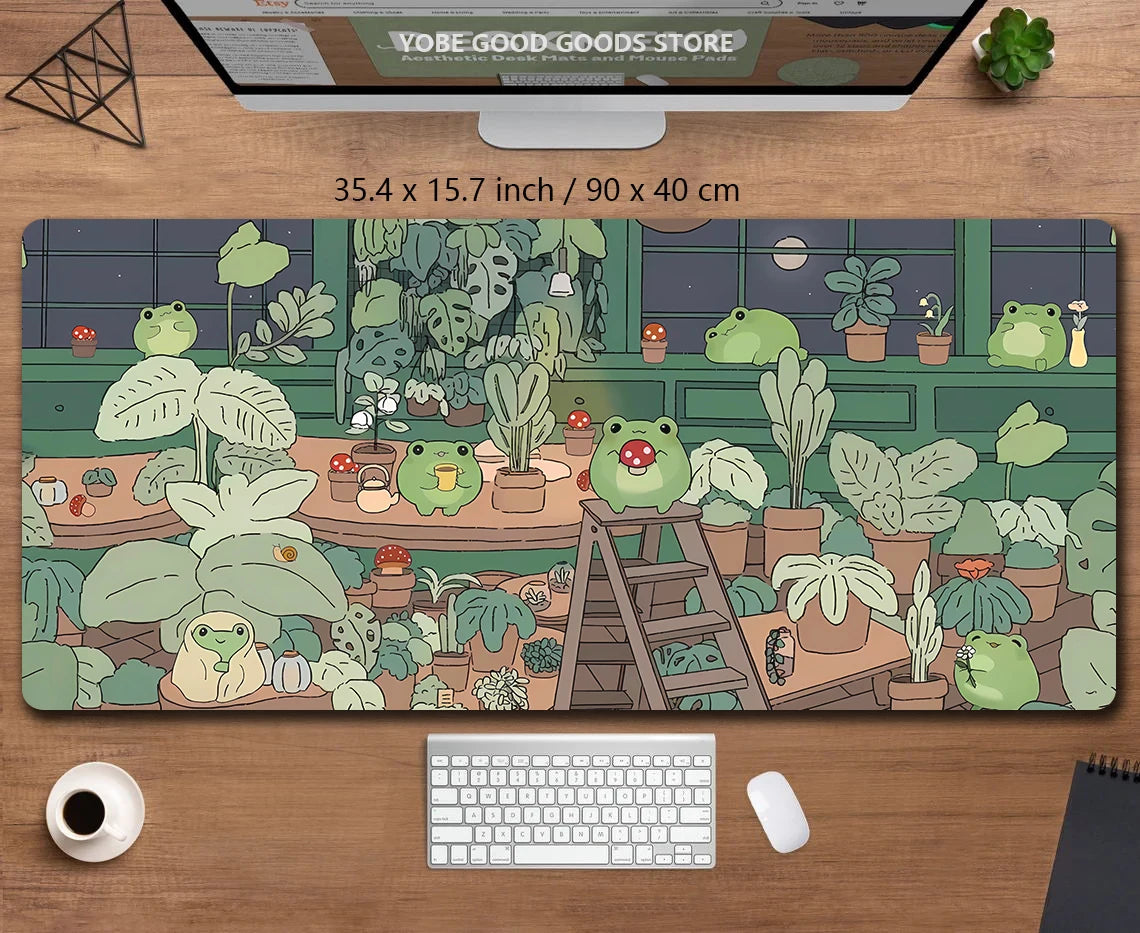 A large desk mat featuring a cute, green frog and various potted plants in a lush jungle setting.