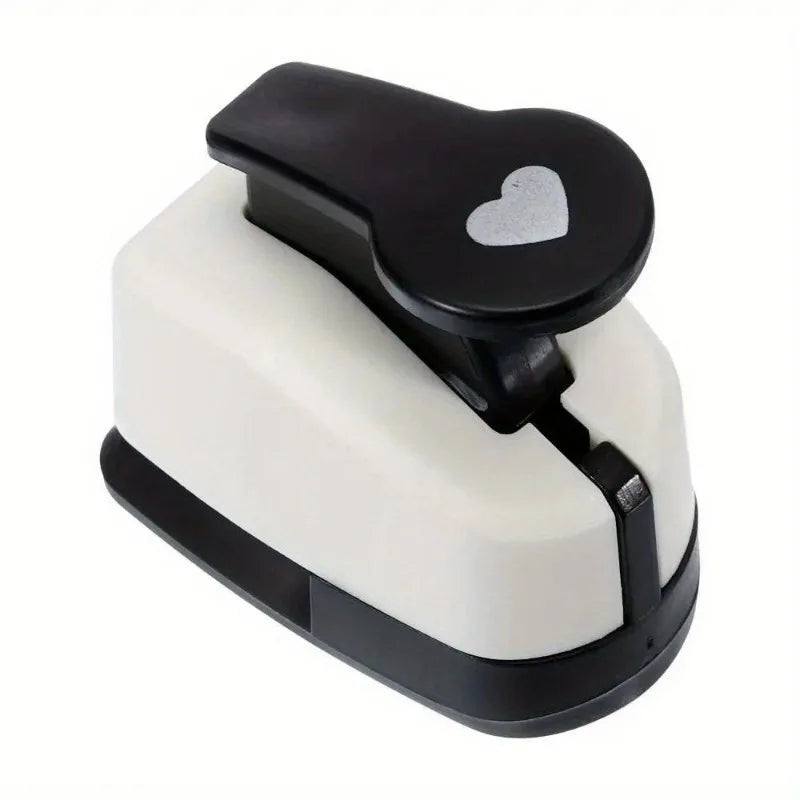 Herramienta de punzón de corazón blanco y negro de precisión para scrapbooking.