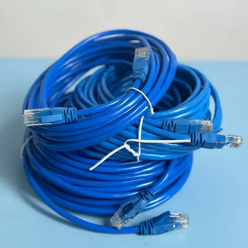 A coil of blue High-Performance Cat6 Ethernet patch cables with RJ45 connectors.