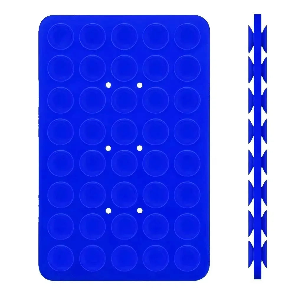 A blue double-sided silicone phone mount grip with multiple circular holes.