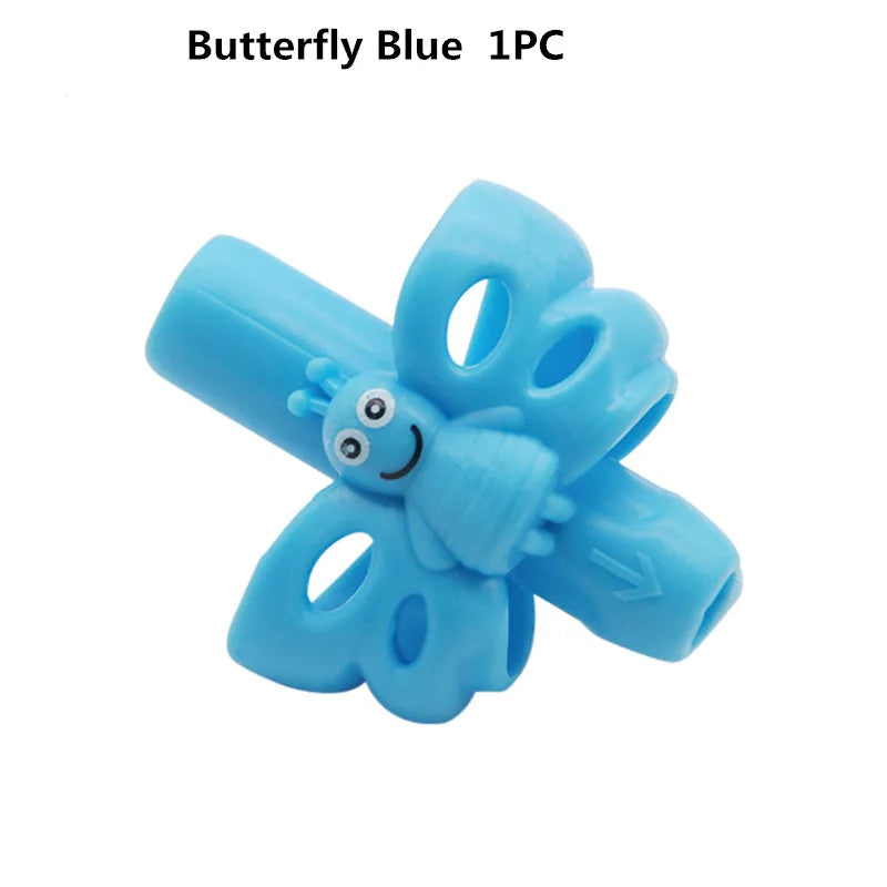 A light blue silicone pencil grip shaped like a butterfly for children's handwriting aid.