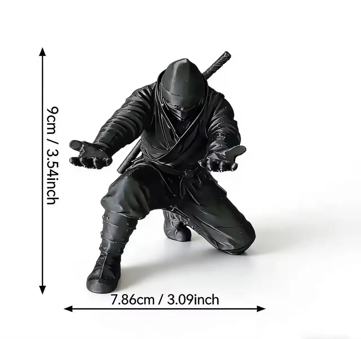 Matte black ninja figurine used as a pen holder, shown in a standing pose.