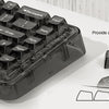 Close-up view of black mechanical keyboard keycaps and a sample showing ergonomic MDA profile keycaps.