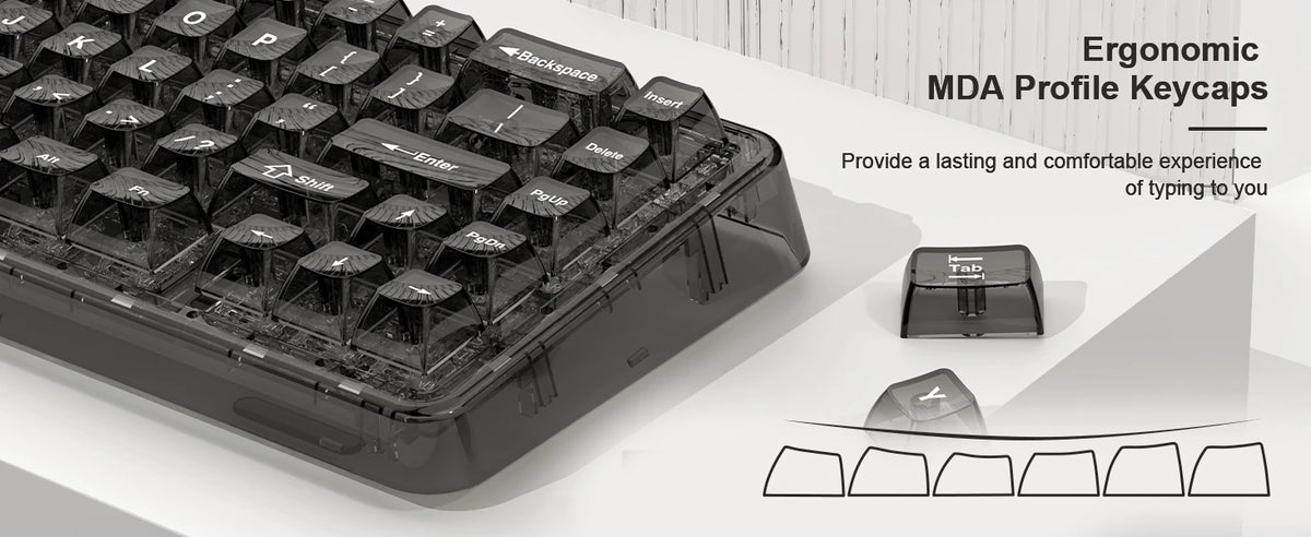 Close-up view of black mechanical keyboard keycaps and a sample showing ergonomic MDA profile keycaps.