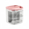 A white desktop pen holder with a pink lid and two clear compartments.