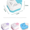 A white and blue 3-in-1 corner rounder punch tool for card making and scrapbooking shown from above and various angles.