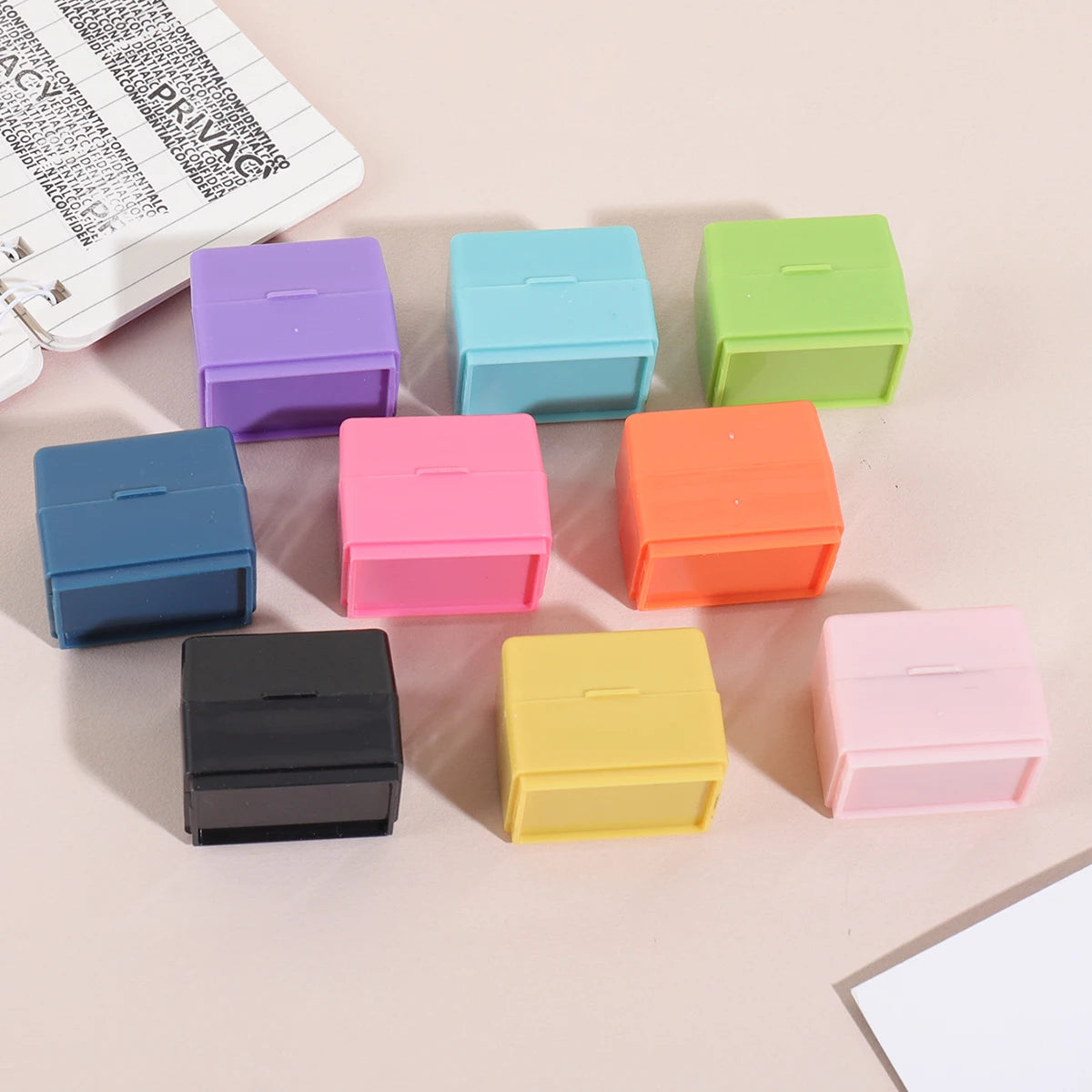 A collection of colorful privacy protection roller stamps in various shades including purple, blue, green, pink, orange, and 