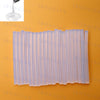 A pack of clear hot melt glue sticks for mini glue guns, showing the individual sticks and a close-up of the glue being dispe