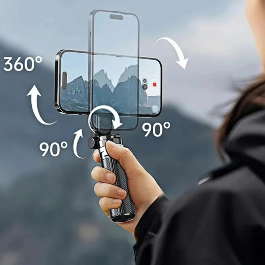 A hand holds a magnetic selfie stick with a smartphone attached, demonstrating 360-degree rotation and 90-degree angle adjust