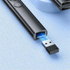 A black presentation pen pointer device is shown emitting a blue light beam from its tip onto a surface.