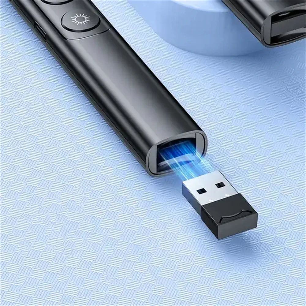 A black presentation pen pointer device is shown emitting a blue light beam from its tip onto a surface.