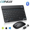 A black portable Bluetooth keyboard shown with a mouse and USB cable for iPad and Android devices.