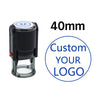 A black self-inking stamp with a clear base and a circular logo design, labeled 40mm.