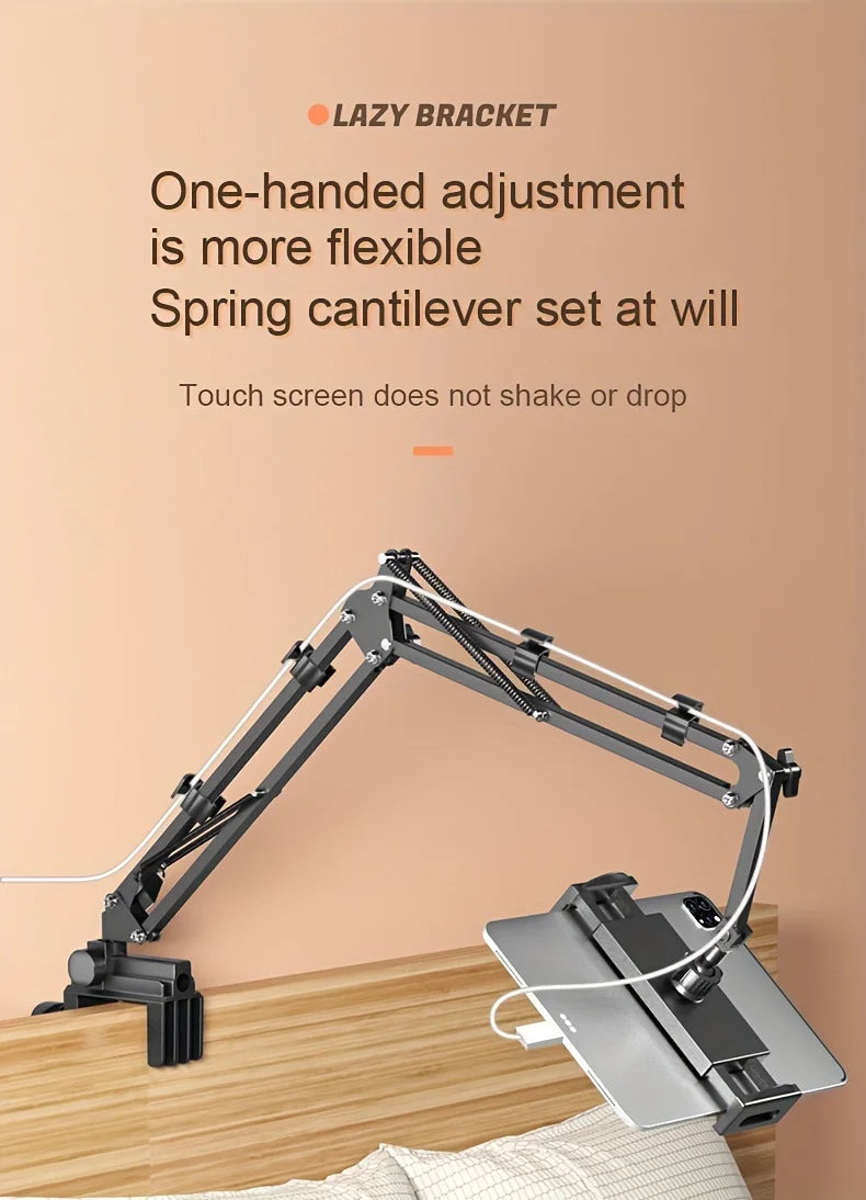 A black spring cantilever set at will adjustable tablet holder with a long arm positioned on a wooden surface.