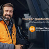 A man wearing a yellow jacket is shown inside a vehicle using a trucker Bluetooth headset for safer driving.