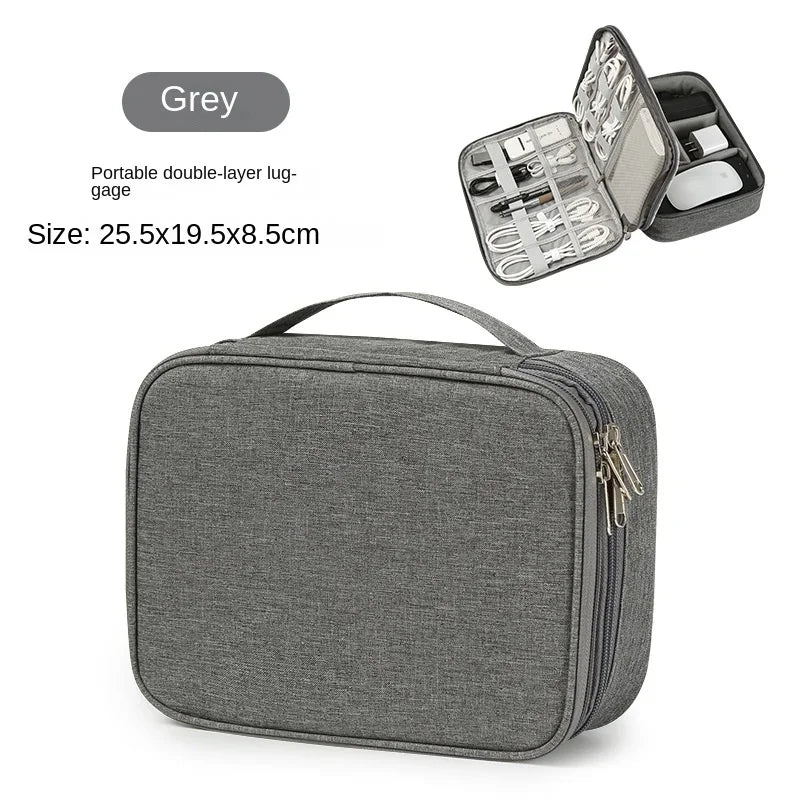A grey portable double-layer luggage bag for organizing and storing electronics cables.
