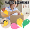 A person is using a yellow plastic box opener and cutting tool to open a cardboard box.