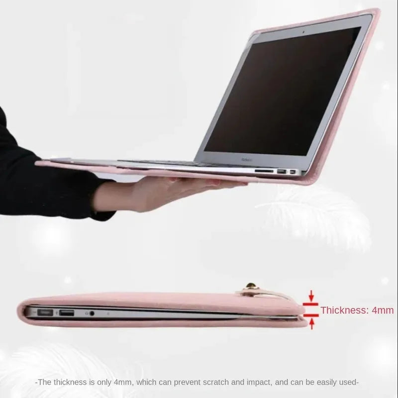 A pink laptop sleeve with a handle is shown open, demonstrating its protective case design.