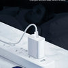A white overnight charging device is shown next to a smartphone, illustrating the feature of intelligent current size change 