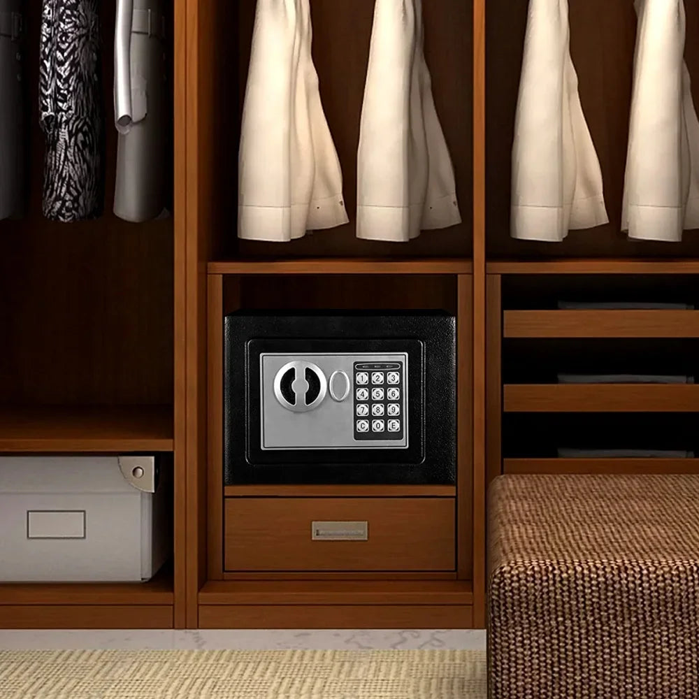 A wooden cabinet displaying a digital lock safe box with a glass door and surrounding fabric items.