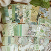 A collection of vintage green and floral patterned paper for DIY scrapbooking and journaling