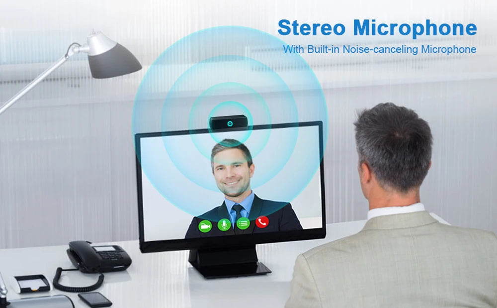 A computer screen shows a man with a green indicator light, demonstrating a stereo microphone setup for video calls.