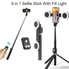 A 6 in 1 selfie stick with fill light and tripod setup for taking photos or videos.