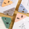 Three colored triangle folder clips are shown on a document, demonstrating different shades of pink, purple, and green.
