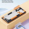 A close-up view of a two-tone selectable mechanical keyboard featuring sunset orange and autumn blue color options.