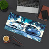 A large gaming mouse pad featuring a dynamic blue and white JDM car design with city lights.