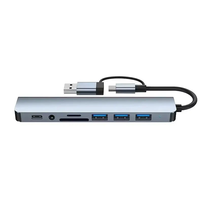 A silver 8-in-2 multi-function USB hub docking station with a black cable.