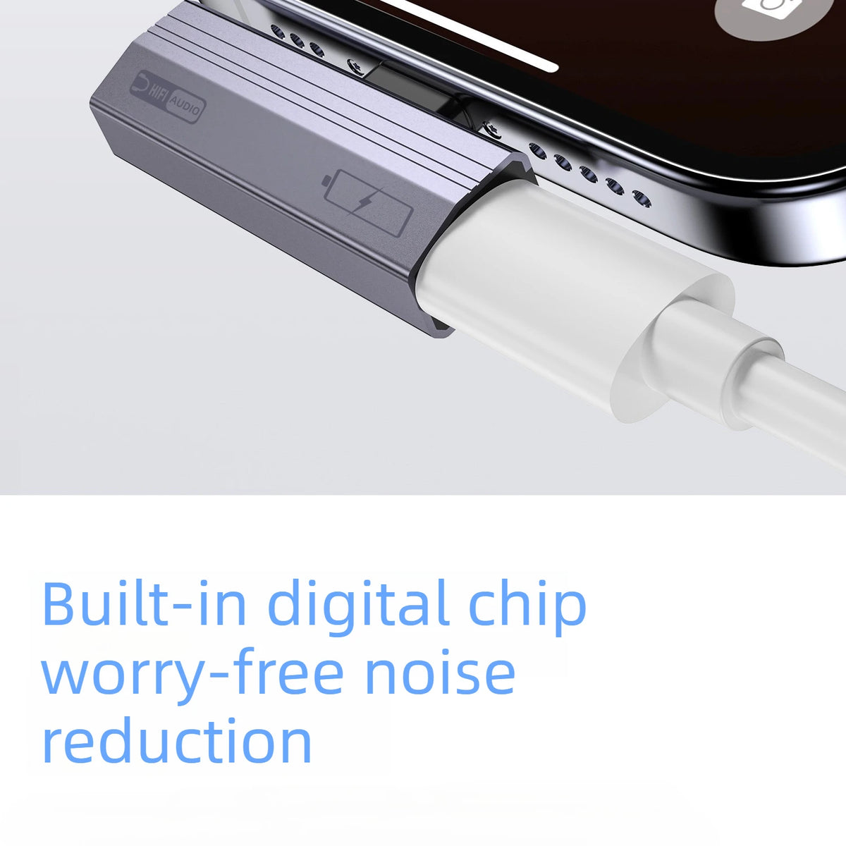 A silver audio adapter connects a device to a smartphone for worry-free noise reduction.