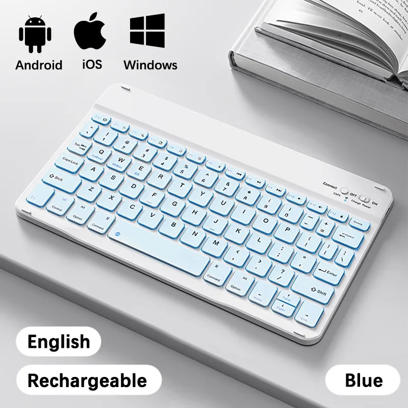 Weißes wiederaufladbares blaues kabelloses Bluetooth-Tastaturlayout auf grauem Untergrund.